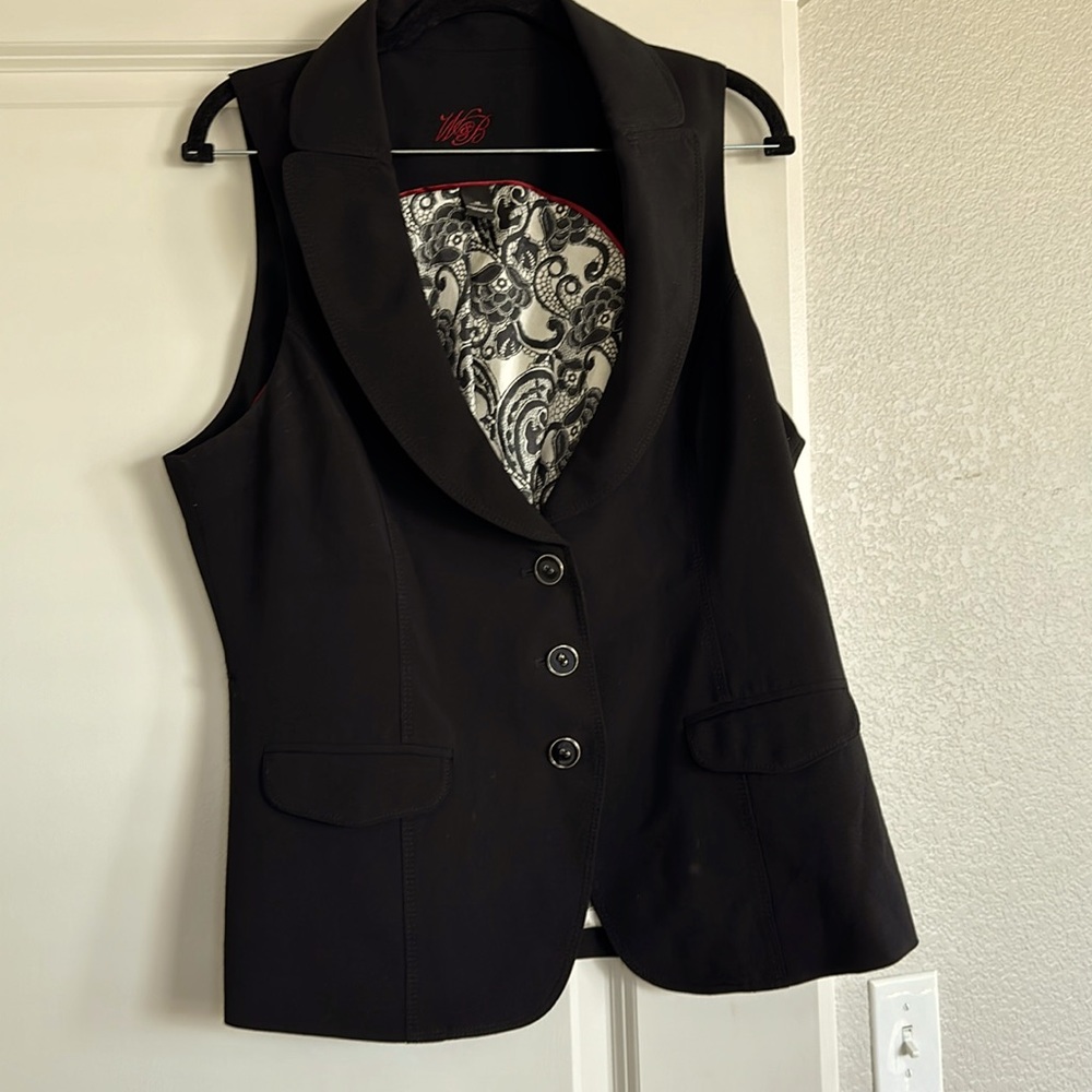 Black button down vest with detail lining size 14